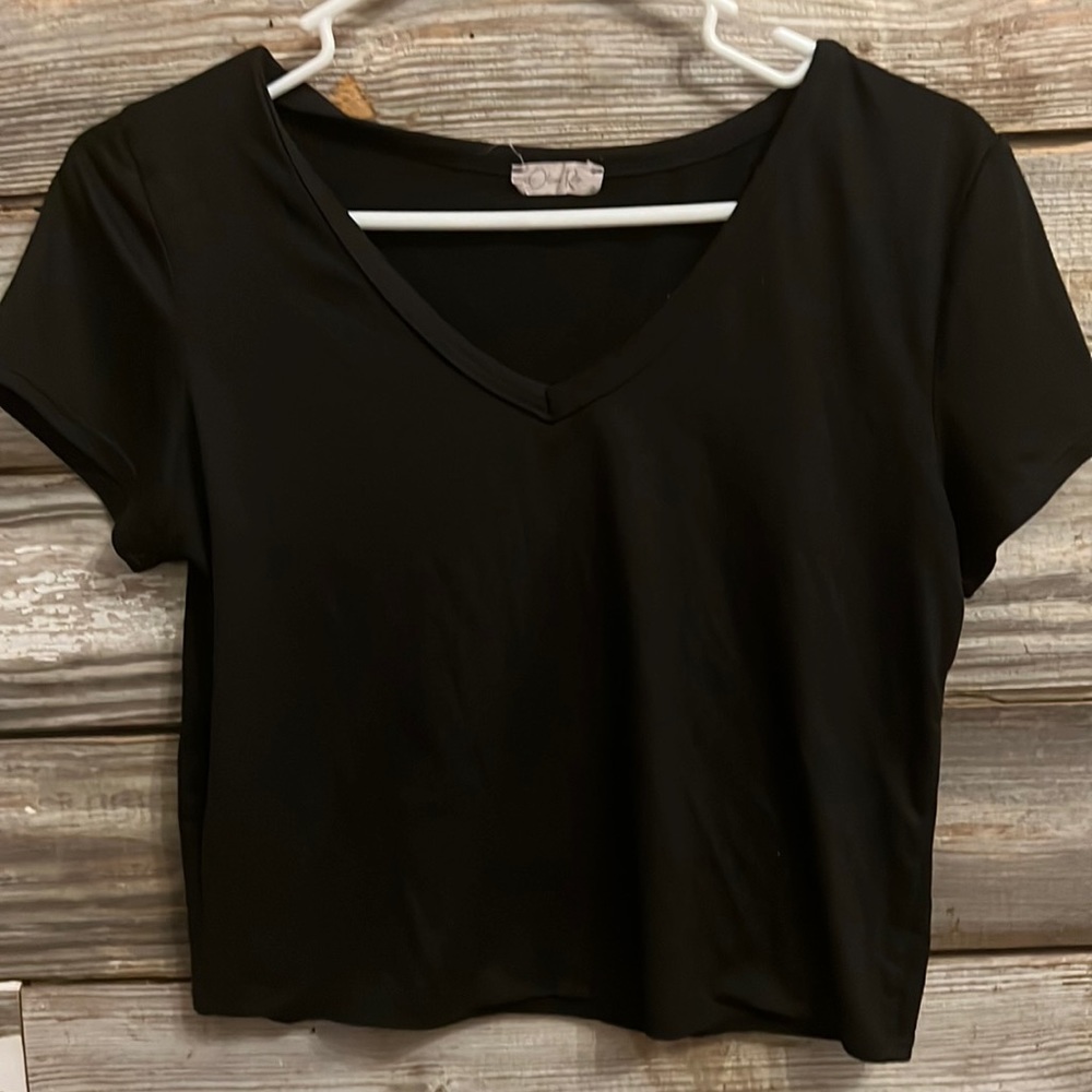 Plain black T a little shorter but not cropped